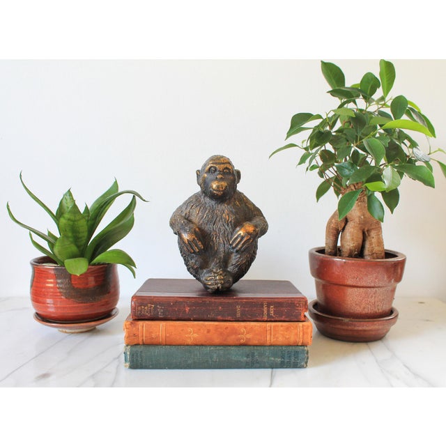 Vintage seated monkey figurine. No makers mark. Minor age wear.