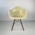 Original 1950s Charles Eames for Herman Miller chair in off white fibreglass shell on a walnut dowel base. Date stamped...
