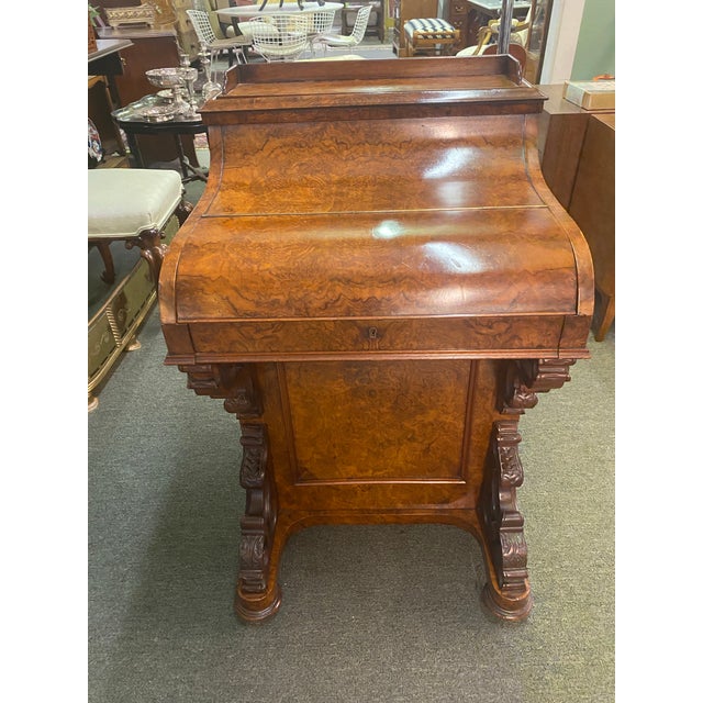 A fantastic quality burr walnut Davenport with pop up and pull out writing slide . Great color and patina. A real stunner!!