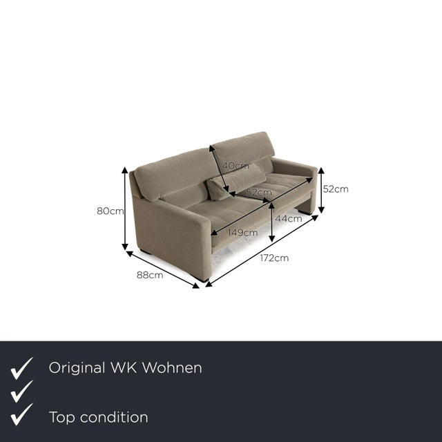 The two-seater WK 663 from WK Wohnen is covered in gray fabric and stands on inconspicuous feet. It is characterized by...