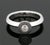 Simple and Beautiful 18K White Gold Diamond Solitaire Ring 18K white gold diamond solitaire ring featuring a bezel set...