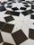 100 % glazed. Round shape. Black and white Moroccan mosaic table measuring approximately 24" in diameter. For both indoors...