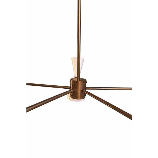 This 5-arm Sputnik style chandelier by Spoon Light features a refined antique brown brass finish and a balanced 10-light...