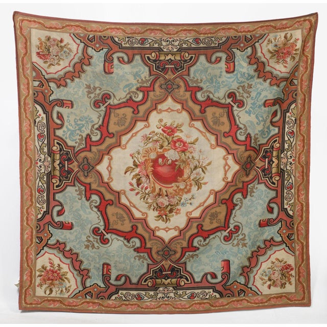 A finely handwoven Spanish tapestry from the 19th century, this 9x9 antique piece reflects the enduring influence of...