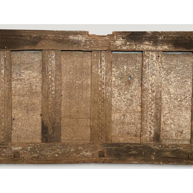 Impressive hand carved ancient panel from Toraja, Sulawesi. This carving symbolizes the protection of the home. Great as...