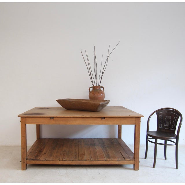A freestanding work table from a bakery. Circa 1930s/40s. Solidly crafted from beech and pine wood. Ideal as a unique...