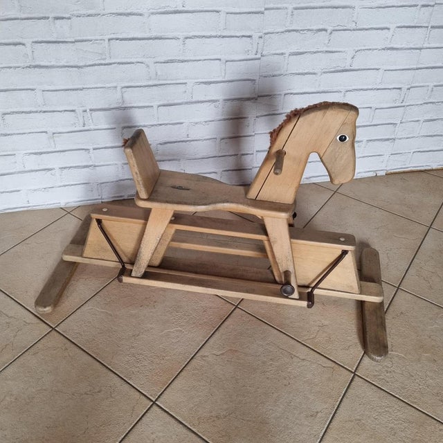 Geuther rocking horse. -Plush mane and tail with traces of handling and wear\.see photos. -Plastic eyes. -Feet...