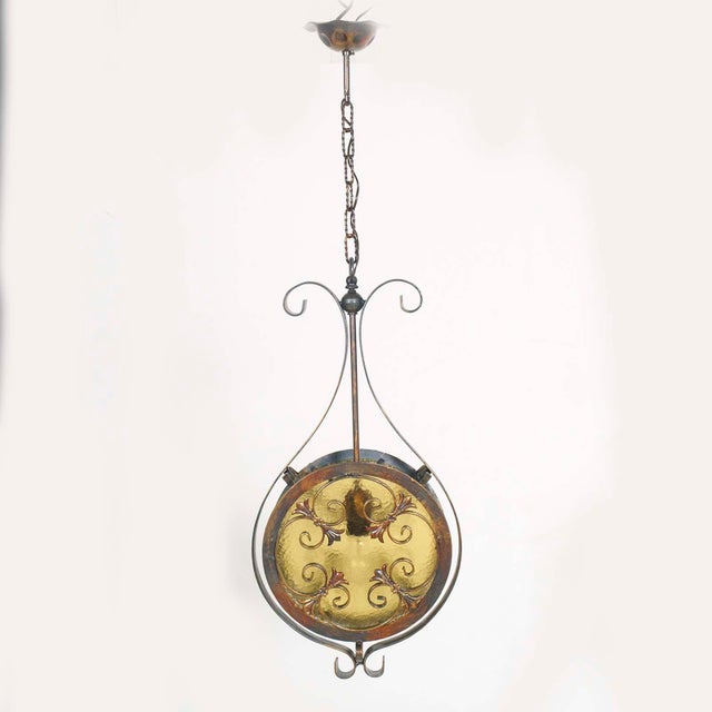 Florence pendant chandelier in wrought iron decorated with gold shades , with bronze chinchilla printed glass diffuser....