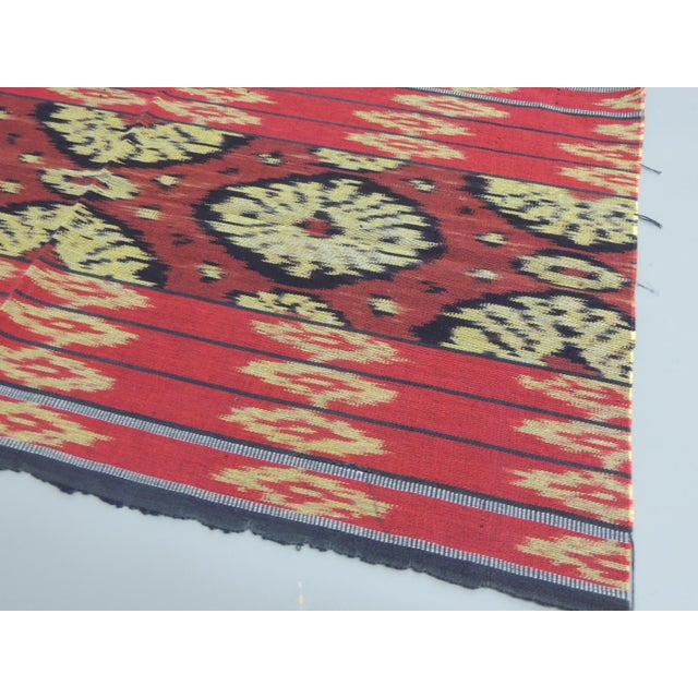 Red & Orange Woven Cotton Ikat Textile From Guatemala. Ideal for pillows or upholstery. Size: 18"H x 31"W