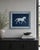 Contemporary original artwork featuring a stylized horse silhouette in soft slate blue against a deep navy background. The...