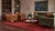An exceptional statement piece for luxury interiors, this hand-knotted modern Tibetan rug pairs a rich crimson hue with...