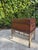 Leather wrapped storage chest on a faux bamboo stand with brass campaign-style hardware and a removable lift-off lid. The...