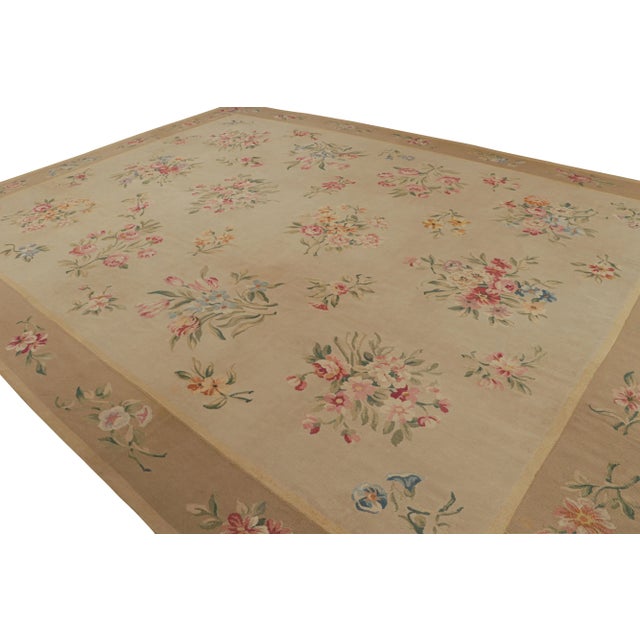 Handwoven in a wool flatweave, this 13x17 antique Aubusson rug is a new unveiling from the European rug collection by Rug...