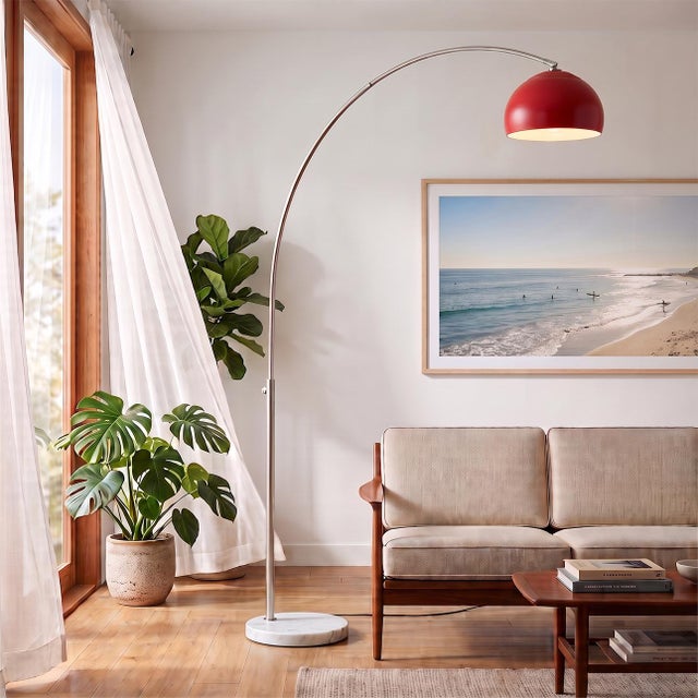 Searching for a sculptural arc floor lamp with a modern metallic finish? The Half Dome Arc Lamp arches 92" tall in...