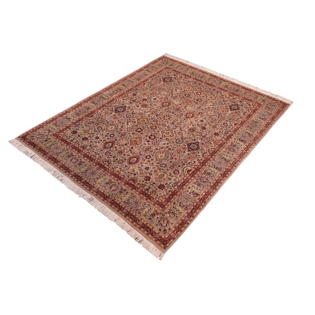 Designed with mesmerizing intricacy and gorgeous color palette, this hand-knotted masterpiece demonstrates the beauty and...