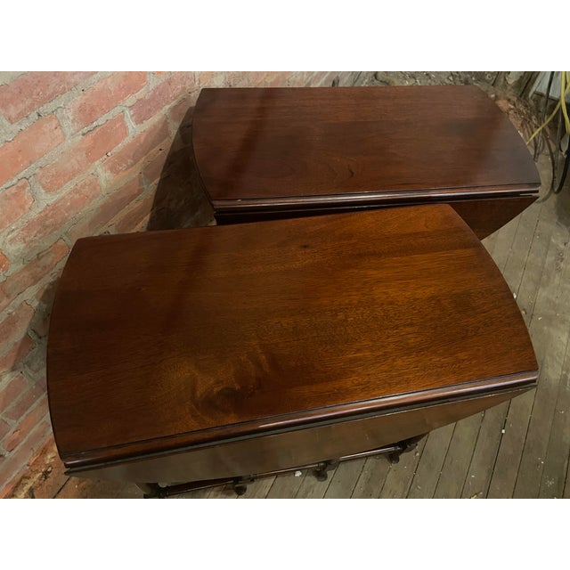 It is hard to find a matching pair of antique gateleg tables and this diminutive set is delicate and so precious! They...