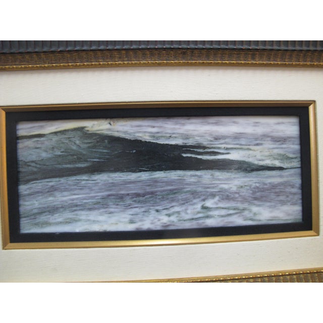 Beautiful Chinese natural stone art showing an ocean or sea formation in tones of deep green, purple, and pale blue. This...