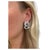 These beautifully crafted earrings in a swirling spray design containing 104 round brilliant, baguette and pear shaped...