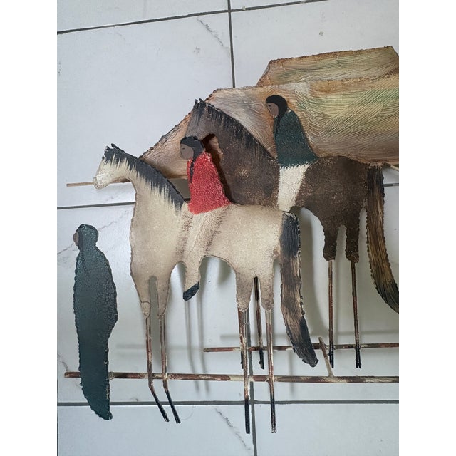 The journey by Curtis Jere 50"W x 21"H. This is a wonderful 3 dimensional sculpture of Native Americans traveling in a...