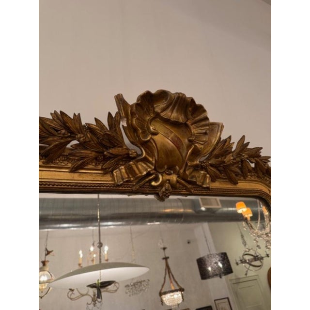 This is a mirror in the Louis Philippe style. These are timeless and always on trend. This mirror has a beautiful crest at...