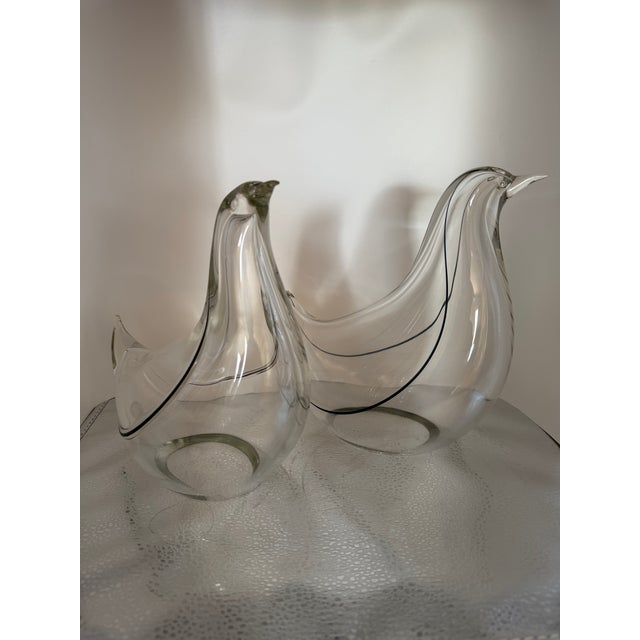 Handblown Murano glass birds that will make you smile and picture yourself in a beautiful setting. You can almost hear...