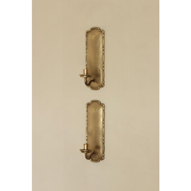 Pair Of Mid Century Style Swedish Brass Sconces by Scandia Stunning pair of Swedish heavy brass sconces, featuring...