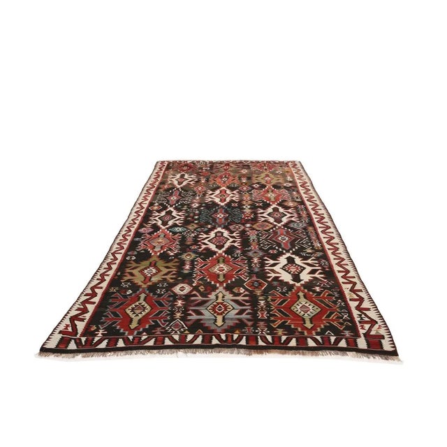 Vintage decorative handwoven Caucasian kilim rug. Approximately 70-80 years old. In very good condition.
