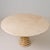 Sculptural pedestal dining table crafted from solid travertine and brass, attributed to Italian designer Marzio Cecchi for...
