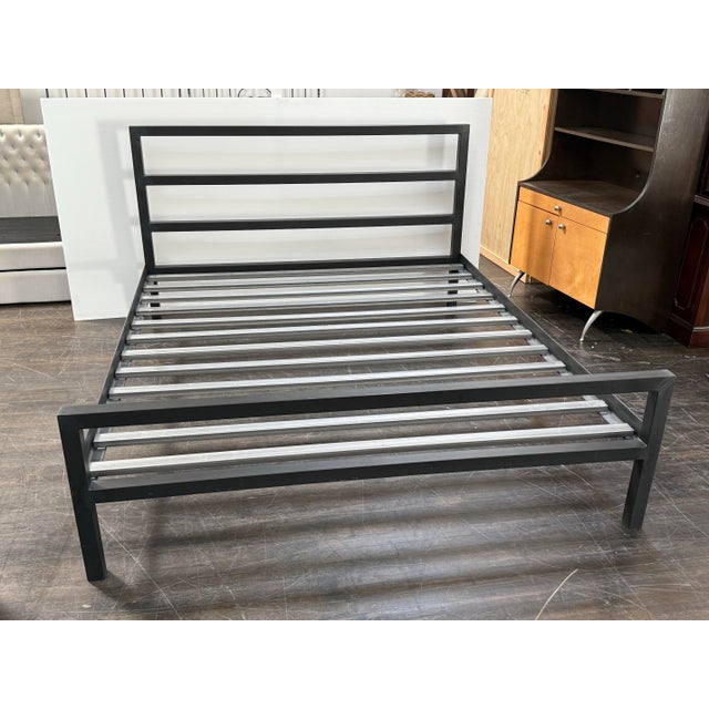Design Plus Gallery presents a California King Parsons Bed Frame from Room & Board. Featuring a clean-lined black metal...