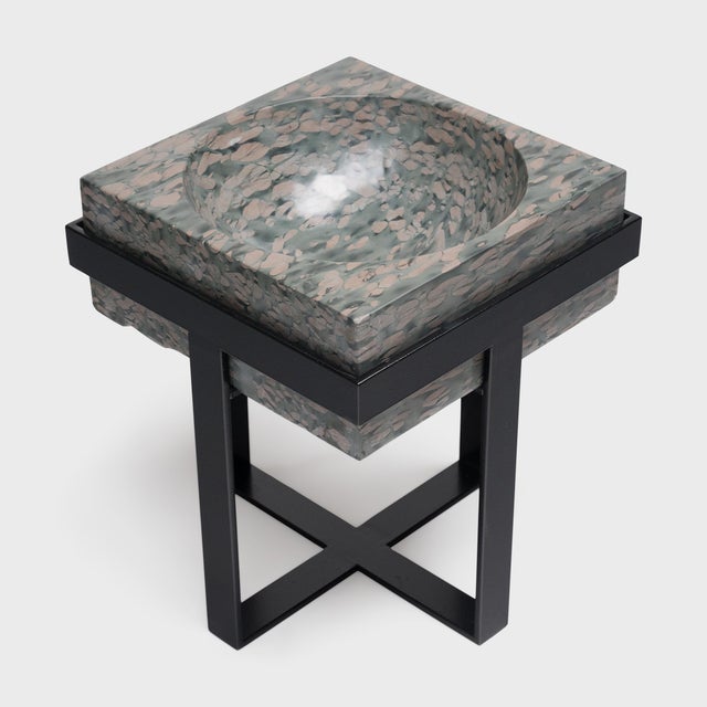 Ideal indoors or out, this clean-lined side table is comprised of a square stone top elevated by a powder-coated steel...