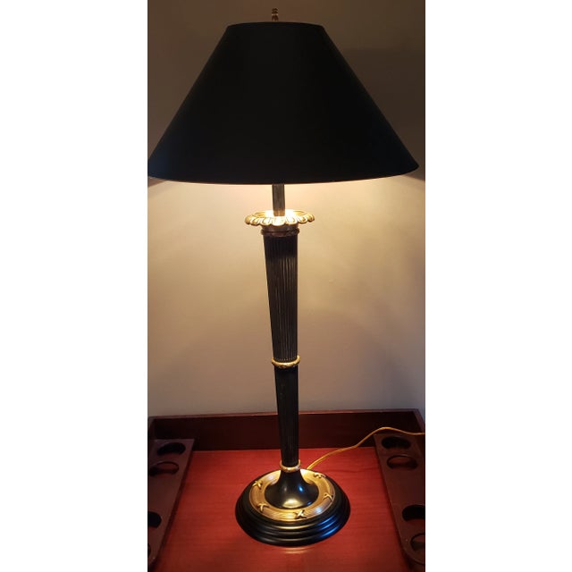 Beautifully detained - Brass and matte black base - comes with a matte black shade with gold foil lining.