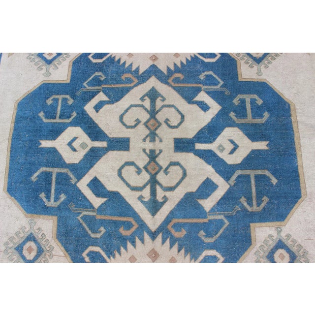 Tan Large Vintage Turkish Rug With Stylized Geometric Design in Blue, Ivory, Tan For Sale - Image 8 of 12
