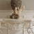 Cream Console Table with Openwork Metal Frame and Scrollwork Ornamentation For Sale - Image 8 of 11