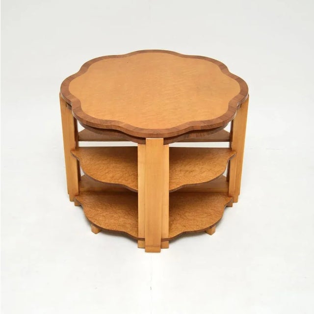 A gorgeous and extremely well made Art Deco birds eye maple nesting coffee table. This was made in England, it dates from...