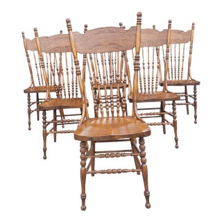 Set of Six Oak Pressed and Spindle Back Saddle Seat Dining Chairs For Sale