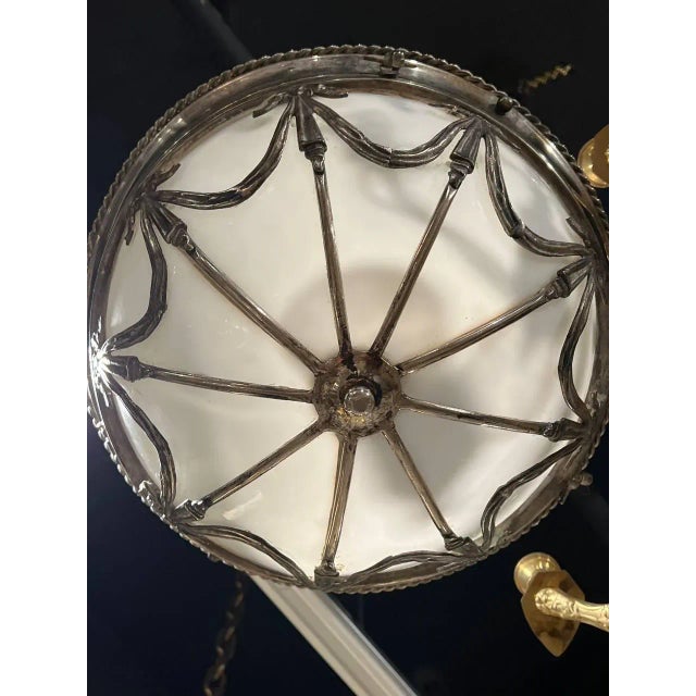 A circa 1930's French silver plated basis light fixture with ribbon design and Opaline glass inside