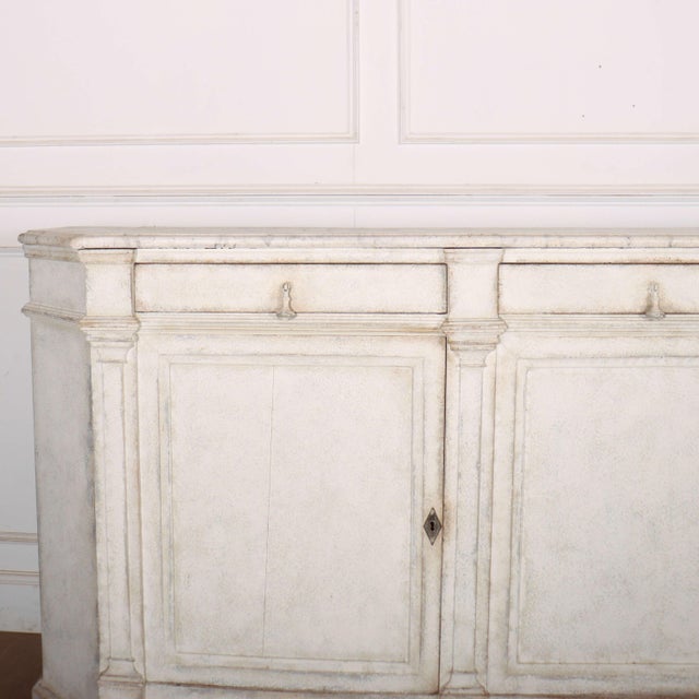 Large early 19th Century French architectural painted enfilade with a painted faux marble top.1840 This piece is designed...