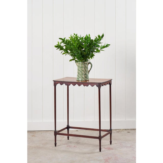 This Georgian Mahogany Spider Table features a scalloped Apron and stunning legs.