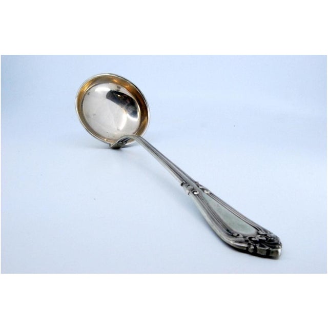 Silver Soup Ladle with Grooves Along the Handle with Reliefs Surrounding Monogram Card For Sale - Image 9 of 10