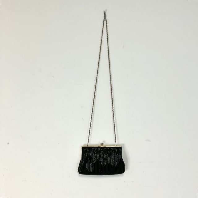 Vintage Home is pleased to offer this Art Deco Hollywood Regency hand-beaded Black Clutch Handbag. It’s a must have for...