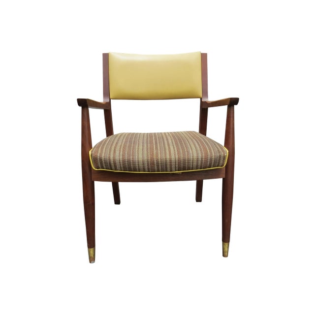 Vintage American mid-century solid walnut office/conference armchairs. These chairs have impeccable details from top to...