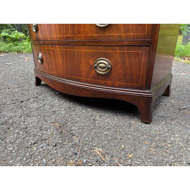 Late 20th Century Georgian-Style Bowfront Flame Mahogany Chest of Drawers by Baker Furniture. For Sale - Image 9 of 17