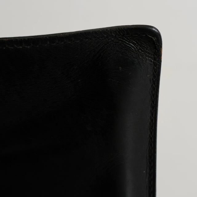 Set of five cab dining chairs designed by mario bellini for cassina and produced in italy in 1977. the set consists of...