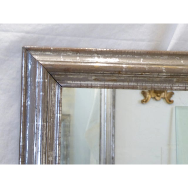 19th Century pewter tone silverleaf elongated mirror, 57"H x 26.25"W.