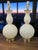 These Mid-Century Modern Style Attributed Murano Art Glass Pair of Table Lamps exudes a timeless elegance with its cream...