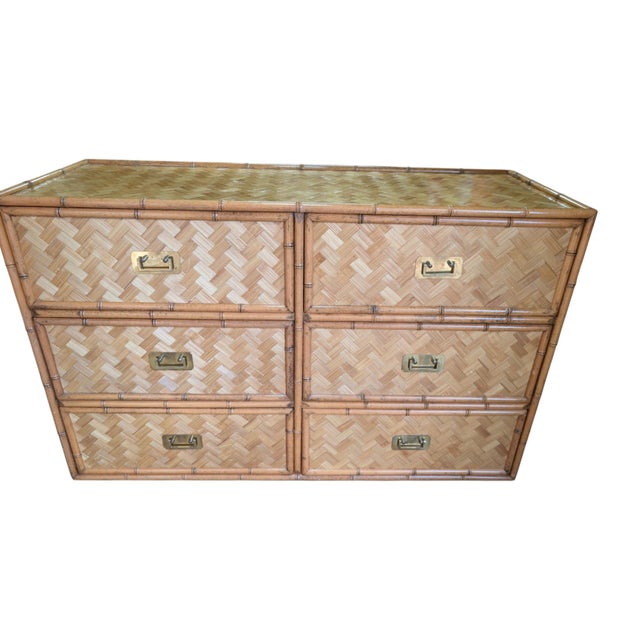 A striking vintage 6-drawer dresser featuring faux-bamboo trim, woven rattan drawer fronts in a herringbone/parquet...