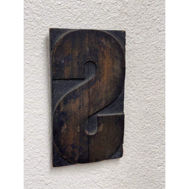 Design Plus Gallery presents a Vintage Letter "S" Wood Block. This vintage wood block has a raised letter form with carved...