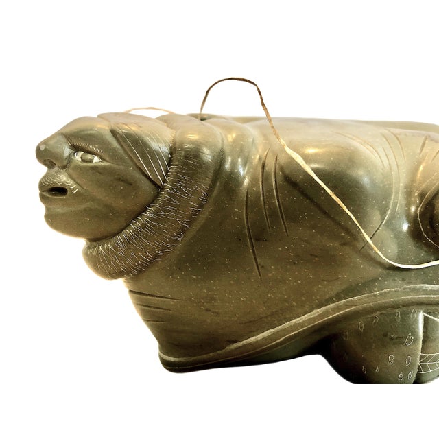 On offer is a highly detailed, authentic late 20th-century Inuit (Eskimo) stone carving depicting a mythological shape-...