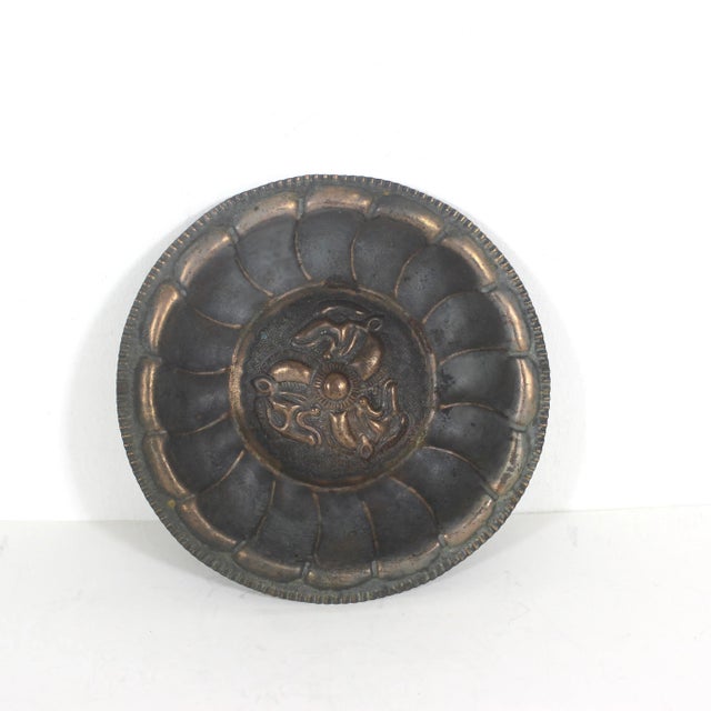 Vintage copper wall plate with a detailed centre with three animal heads…maybe horses? The details are beautiful. Great...