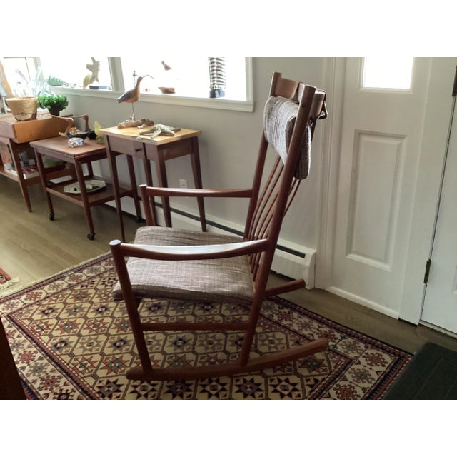 This rocker is large and comfortable. It was designed by Hans J Wegner for Tarm Stolle. The chair originally had a label,...